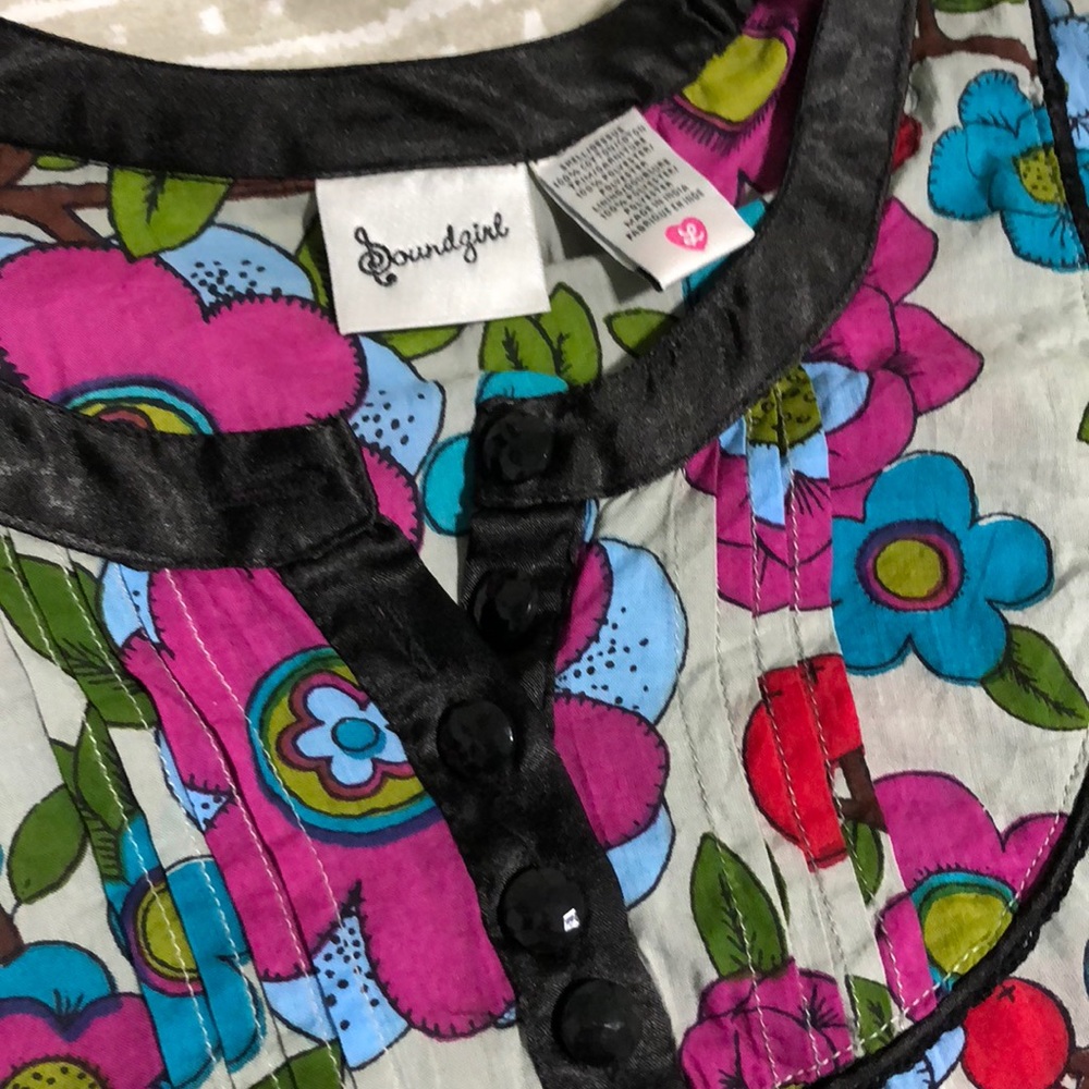 Vivid floral pattern with black trim cotton dress